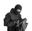 Foto: Masked criminal holding a stolen handbag, isolated on white Masked criminal holding a stolen handbag, isolated on white