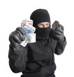 Foto: Masked criminal holding a stolen leather purse, isolated on whit Masked criminal holding a stolen leather purse, isolated on whit