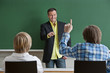 Photo: Klassenzimmer mit Schüler und Lehrer. Klassenzimmer mit Schüler und Lehrer.