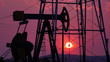 oil derrick mechanism in the sunset