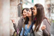 Three Beautiful Young Women doing Shopping