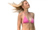 Woman in pink bikini turning head in slow motion