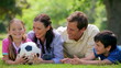 Video: Smiling family trying to catch a soccer ball Smiling family trying to catch a soccer ball