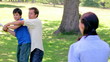 Smiling family playing baseball