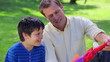 Video: Father and son holding a kite Father and son holding a kite
