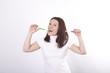 Young beautiful woman with two toothbrushes