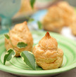 fresh creamy eclair cakes served on green plate
