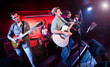 Foto: musician plays a guitar musician plays a guitar