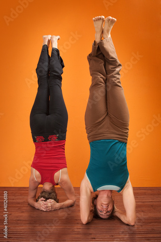 Photo: Women In Sirsasana Position Women In Sirsasana Position