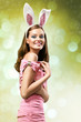Photo: easter picture of young woman wearing pink easter bunny costume easter picture of young woman wearing pink easter bunny costume