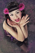 Beautiful Vietnamese girl dressed in oriental pin up style