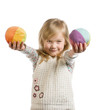 Small girl holding soft multi-colored balls Small girl holding soft multi-colored balls