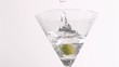 An olive dropping in super slow motion An olive dropping in super slow motion