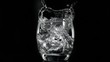 Ice cube falling in super slow motion in vodka