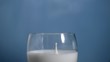 Drop splashing in super slow motion in milk