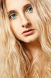 closeup woman face with curly hair closeup woman face with curly hair