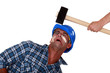 Man being hit over the head by hammer