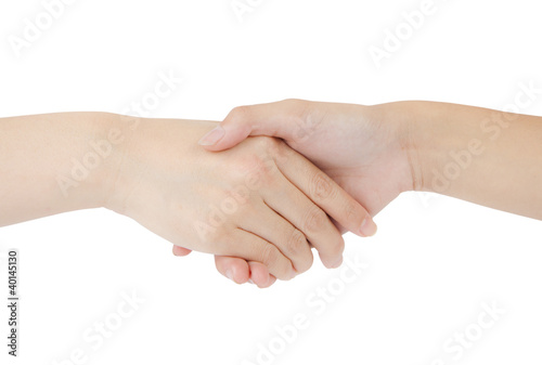 Photo: Two woman shaking hands . Two woman shaking hands .