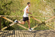 Young healthy man running at the park Young healthy man running at the park