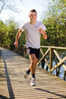 Young healthy man running at the park Young healthy man running at the park