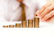 a man rising coins