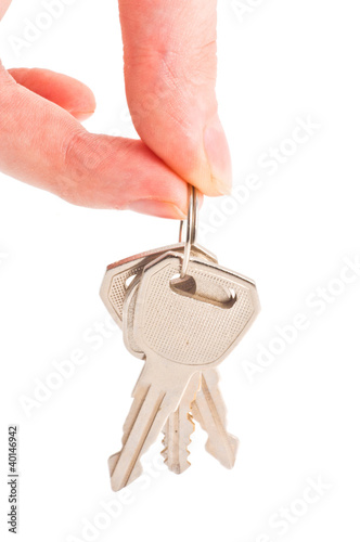 Photo: human hand with keys on white human hand with keys on white