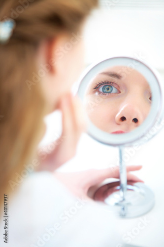 Photo: woman with mirror woman with mirror