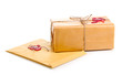 Parcel and envelope with sealing wax isolated on white
