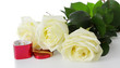 White roses and wedding ring