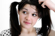 confused young brunette woman