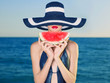Photo: Young lady at sea with watermelon Young lady at sea with watermelon