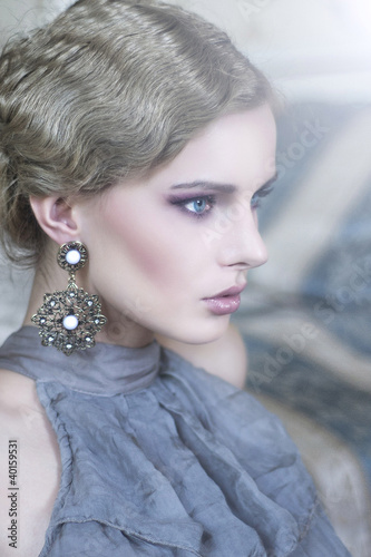 Photo: Portrait of a beauty woman in stylish room Portrait of a beauty woman in stylish room
