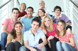Photo: Group of young people sitting on stairs Group of young people sitting on stairs