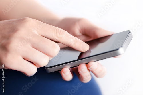 Photo: Girl With Mobile Smart Phone Girl With Mobile Smart Phone