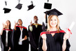 happy female graduate at graduation with classmates