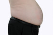 Foto: Bauch von einem uebergewichtigen Mann. Bauch von einem uebergewichtigen Mann.