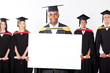 male african graduate with white board