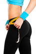 Woman controlling her measures using a tape