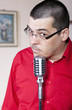 Funny man with old retro microphone