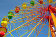 Colorful ferris wheel and blue sky