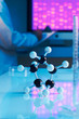 close up of molecular model with dna sample