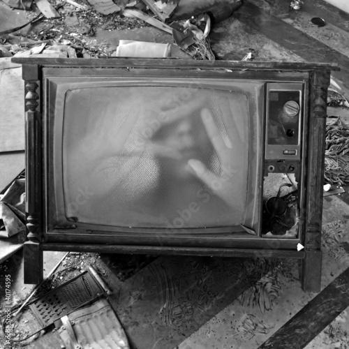 Photo: ghostly figure on vintage tv set ghostly figure on vintage tv set