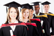 group of multiracial graduates at graduation