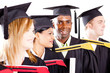 group of diverse graduates at graduation