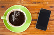 cup and smartphone