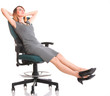 Full length business woman sitting on chair holding clipboard is