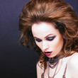 Beautiful woman with evening make-up. Fashion photo