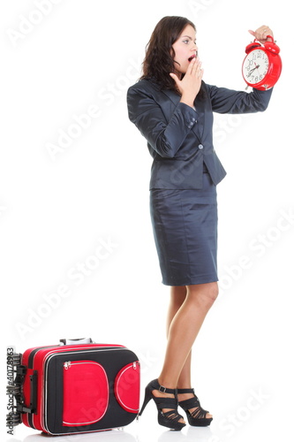 Photo: Full length young business woman to late red travel bagd Full length young business woman to late red travel bagd