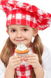 Little chef holding muffin