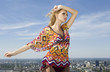 beautiful girl on background blue sky